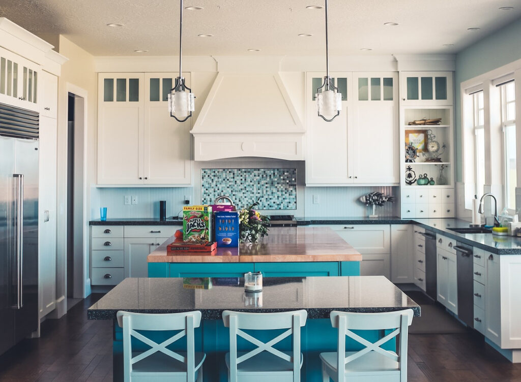 The blue accent tones in this remodeled kitchen give it a refreshing and clean look.